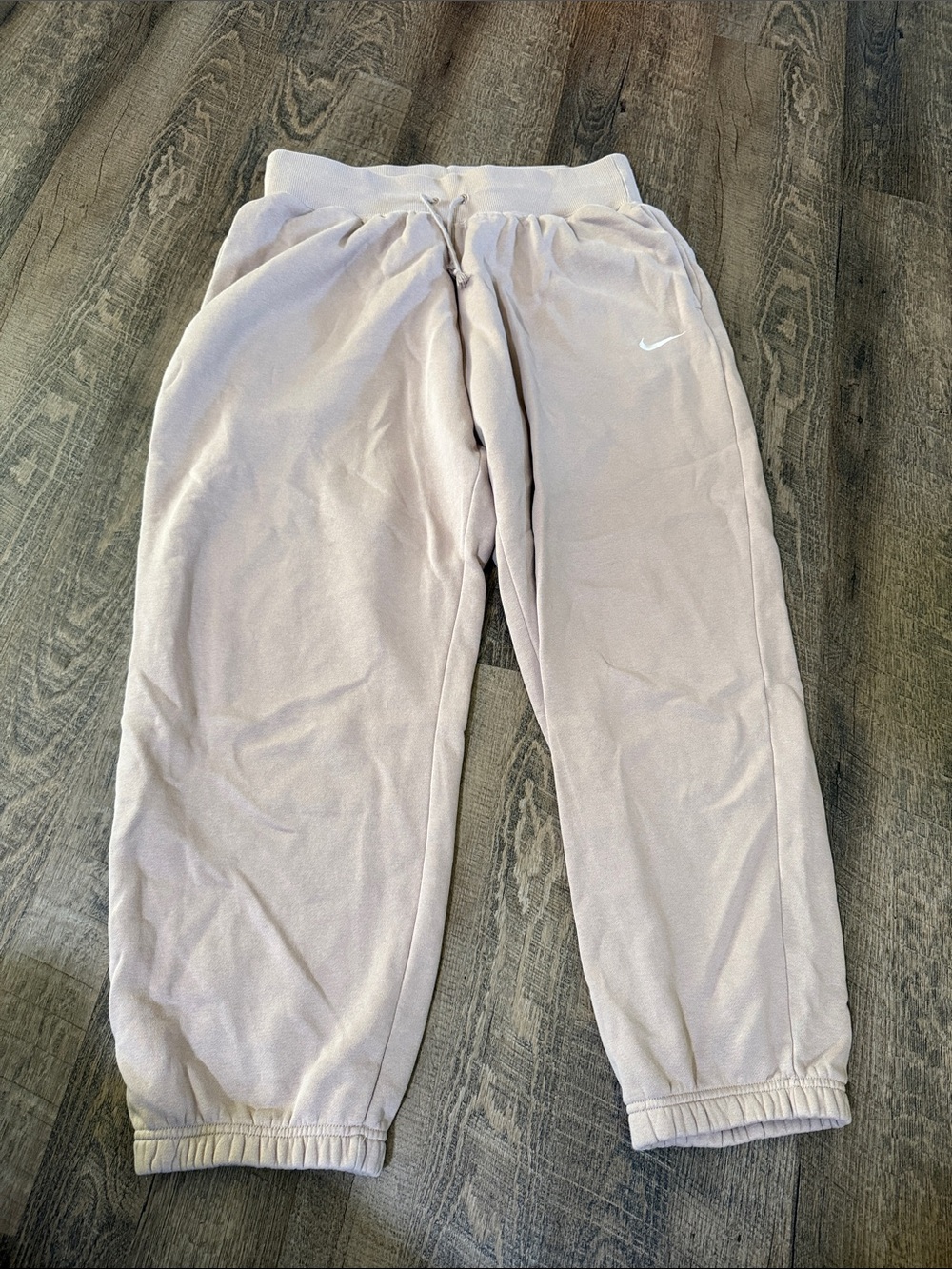 Nike Women’s Mauve Fleece Joggers with White Swoosh